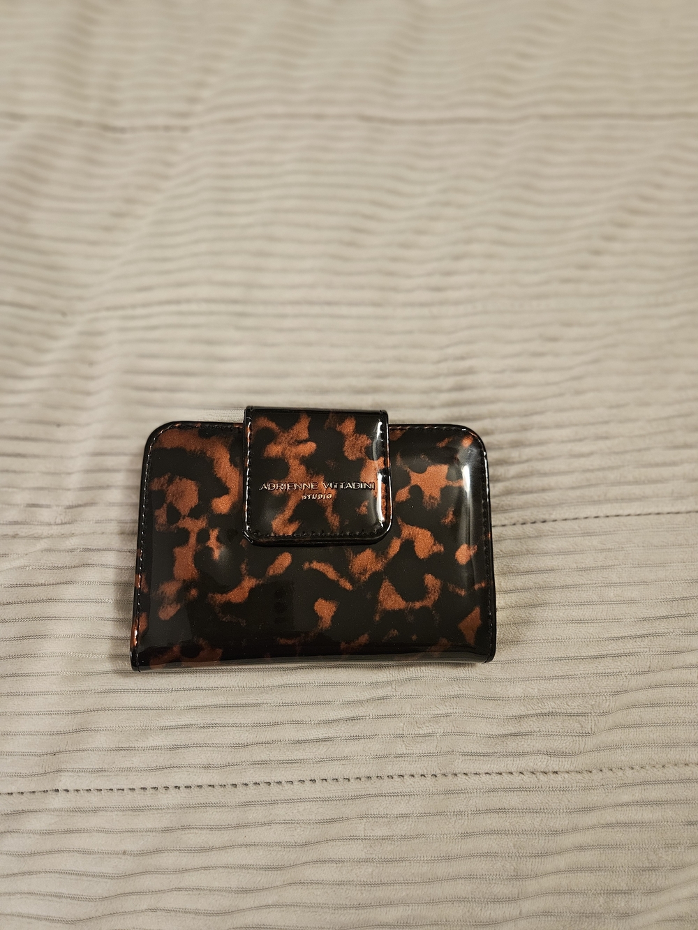Adrienne Vittadini Brown Tortoiseshell Patent Wallet